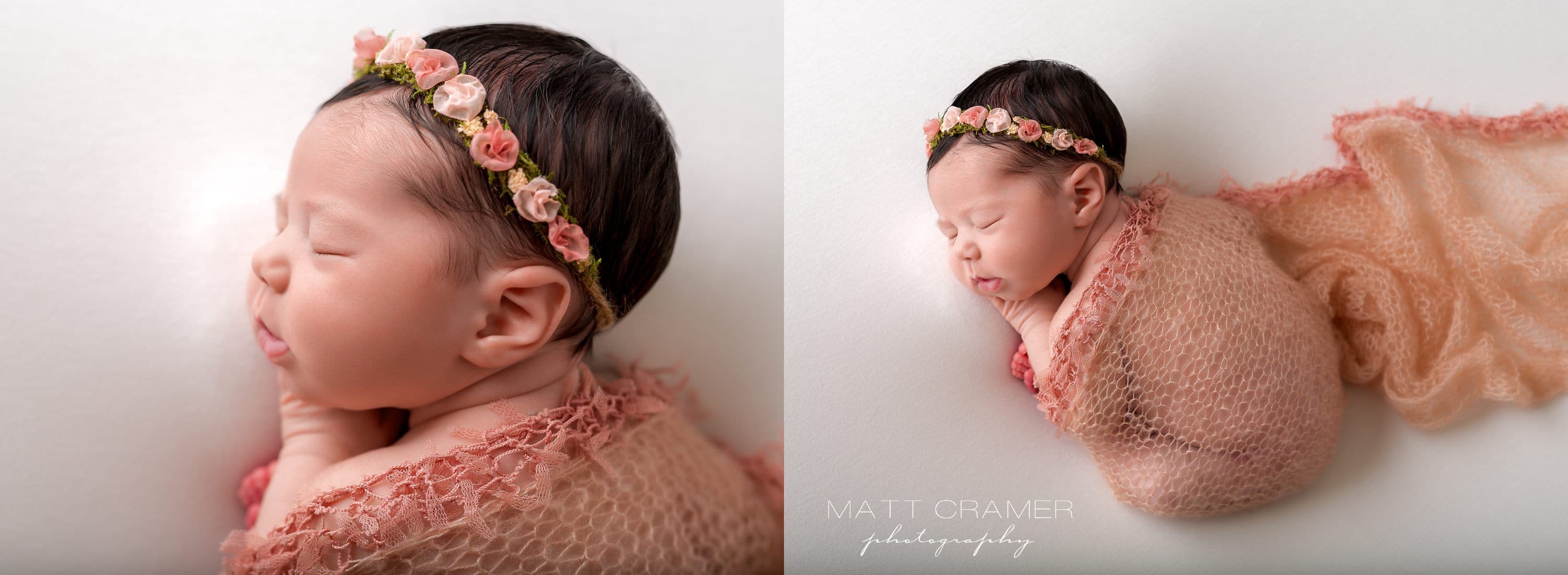 aerial photo of sleeping newborn covered with pink wrap