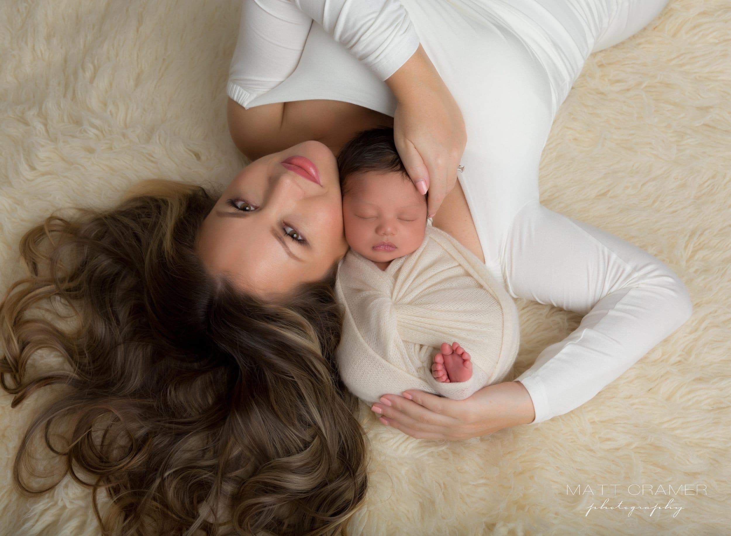 mom and new baby boy during newborn session