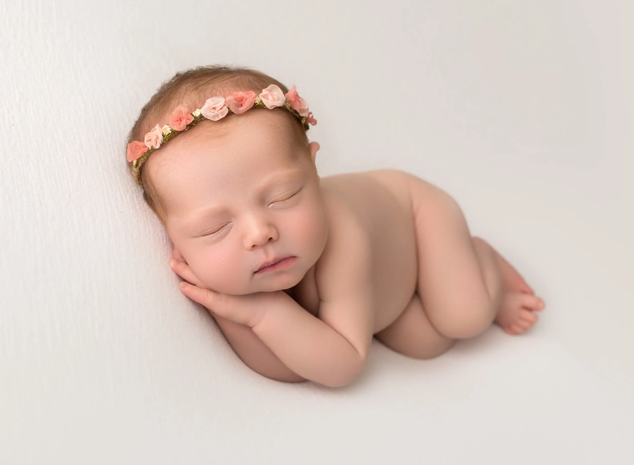 baby girl newborn photo, side laying pose