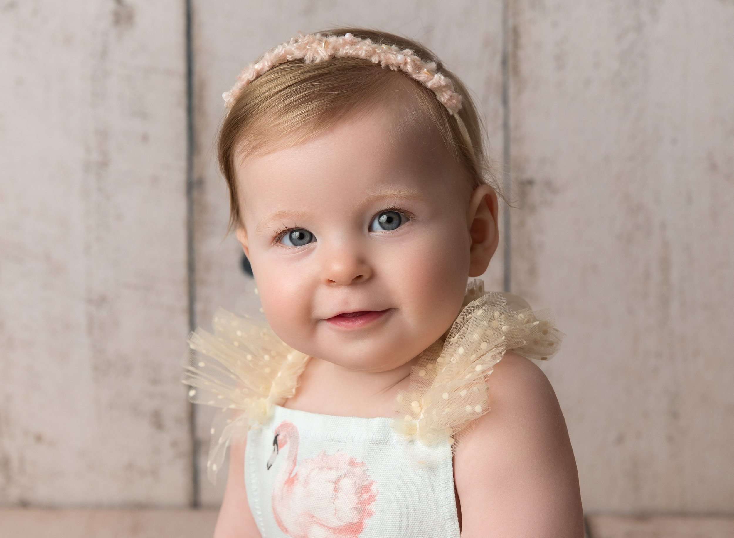 six month baby girl wearing flamingo print outfit