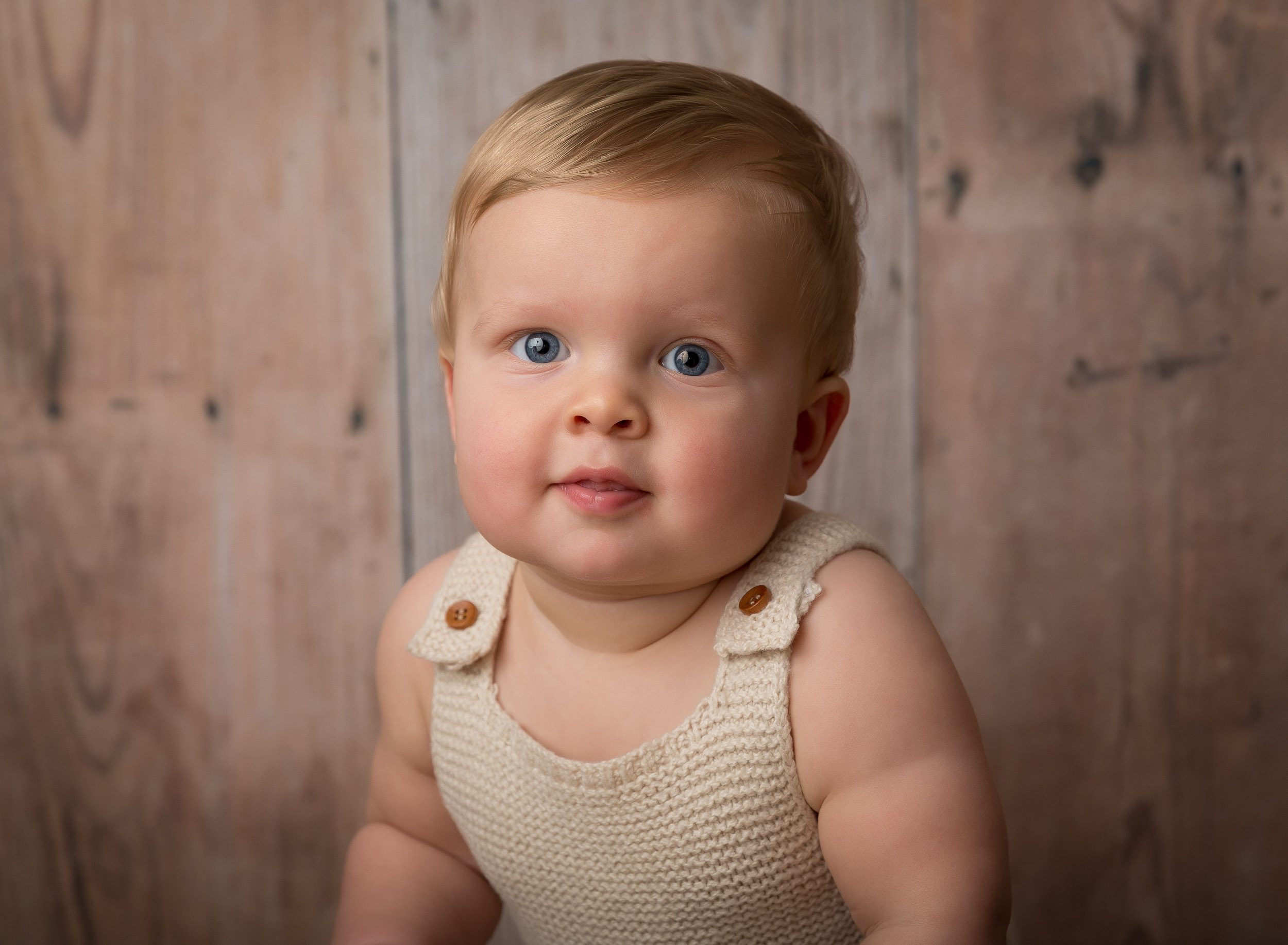 blonde hair baby boy in neutral outfit